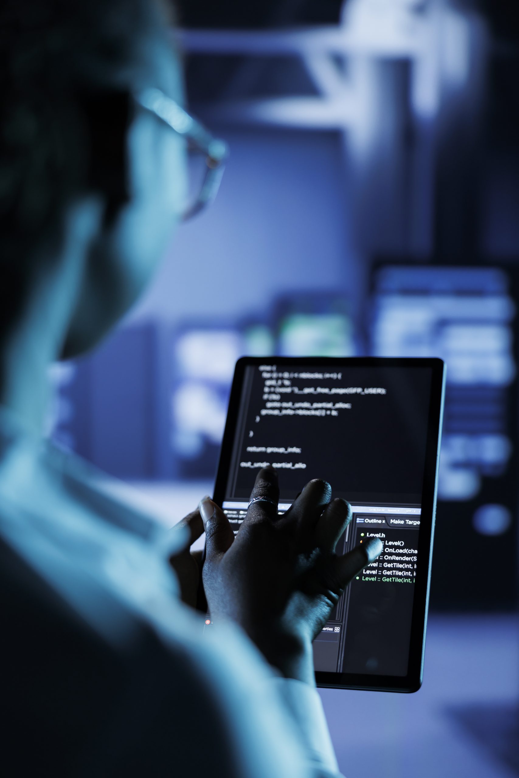 Data center manager codes on tablet