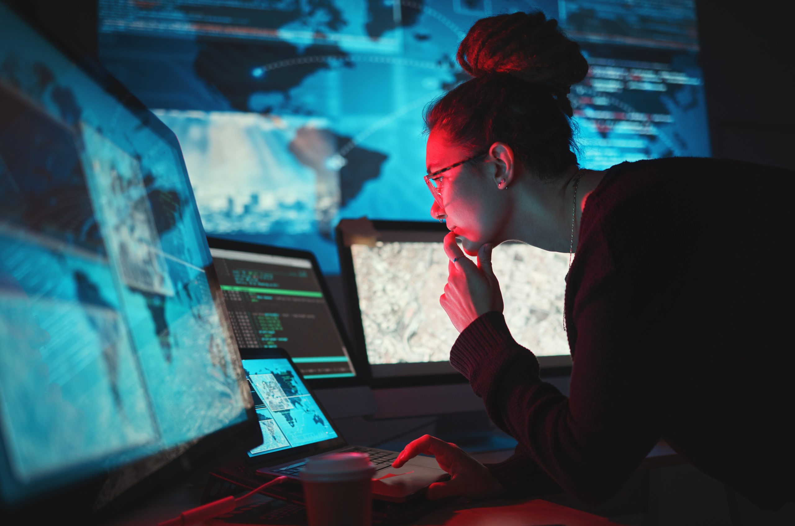 focused-woman-working-with-multiple-computer-scree-2026-03-25-03-30-58-utc